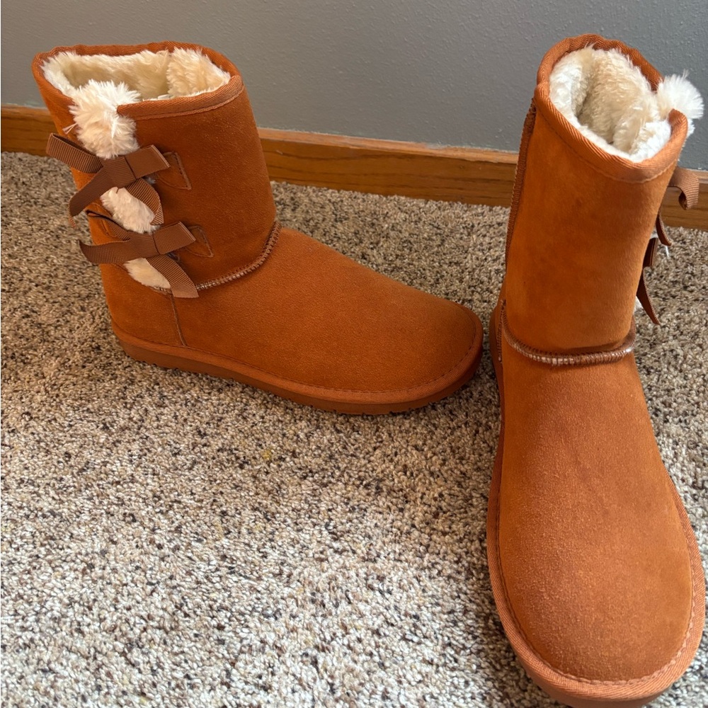 Boots with bows on side
